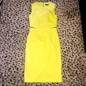 Gorgeous chartreuse cut out / cutout sheath dress.